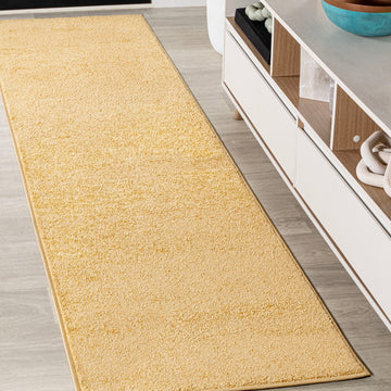 Haze Solid Low-pile Area Rug Mustard